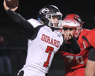 he Vindicator  Girard's Mark Waid(7) eludes Perry's Hayden Makad(704) during 1rst half action at Twinsburg.