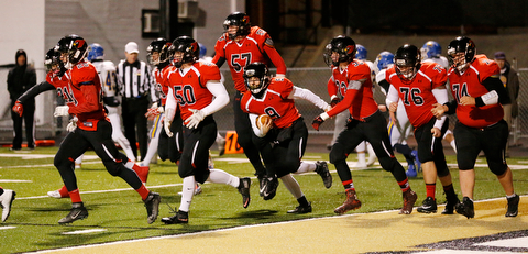 WARREN, OHIO - NOVEMBER 10, 2017:  Canfield's Nick Ieraci (9) celebrates with his teammates a 2pt conversion during the 1st qtr. at Harding High School, Mollenkopf Stadium.  MICHAEL G TAYLOR | THE VINDICATOR