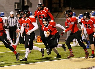 WARREN, OHIO - NOVEMBER 10, 2017:  Canfield's Nick Ieraci (9) celebrates with his teammates a 2pt conversion during the 1st qtr. at Harding High School, Mollenkopf Stadium.  MICHAEL G TAYLOR | THE VINDICATOR