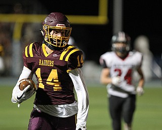 Aniello Buzzacco (14) outruns the Manchester defense down the sidelines for a touchdown during the first half of Friday nights matchup at Louisville High School in Louisville.  Dustin Livesay  |  The Vindicator  11/10/17  Louisville.