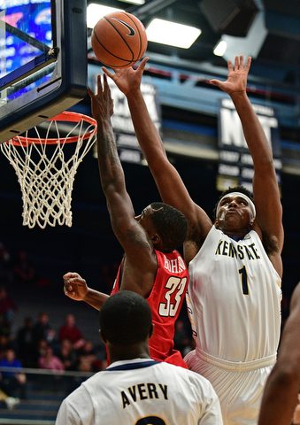 AKRON, OHIO - NOVEMBER 11, 2017: Youngstown State's Nad Bohannon has his shot blocked by Kent State's Adonis De La Rosa during the first half of their game Saturday night at James A. Rhodes Arena. DAVID DERMER | THE VINDICATOR