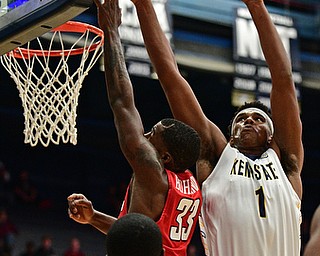 AKRON, OHIO - NOVEMBER 11, 2017: Youngstown State's Nad Bohannon has his shot blocked by Kent State's Adonis De La Rosa during the first half of their game Saturday night at James A. Rhodes Arena. DAVID DERMER | THE VINDICATOR