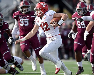 Youngstown State quarterback Ricky Davis (12) picks up yardage in the first quarter against Southern Illinois at Saluki Stadium on Saturday.