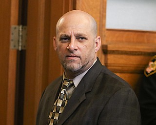   ROBERT K YOSAY  | THE VINDICATOR..Hamad... glares at his defense team and the families.. of the dead and wounded he was found guilty of...The judge Ronald Rice  in the Nasser Hamad trial has sentenced Hamad to life in prison with parole eligibility after 36 years, assistant Trumbull County Prosecutor Chris Becker has confirmed.