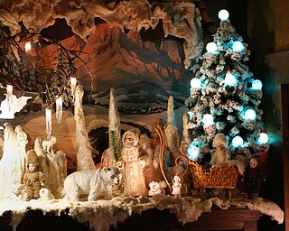 ROBERT K YOSAY | THE VINDICATOR..The Arms Family Museum in Youngstown Ohio is sparkling for the holiday season! Memories of Christmas Past, the annual holiday spectacular, is in its tenth year in the 1905 Arts & Crafts mansion of Olive and Wilford Arms, and the home of the Mahoning Valley Historical Society. The seven period rooms of the Arms Family home are filled to the brim with rare, one-of-a-kind, vintage decorations that include ornaments, lighting, trees, and toys. This display features many pieces from the Historical SocietyÕs collection as well as items on loan from private collectors..-30-