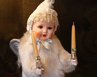 ROBERT K YOSAY | THE VINDICATOR..The Arms Family Museum in Youngstown Ohio is sparkling for the holiday season! Memories of Christmas Past, the annual holiday spectacular, is in its tenth year in the 1905 Arts & Crafts mansion of Olive and Wilford Arms, and the home of the Mahoning Valley Historical Society. The seven period rooms of the Arms Family home are filled to the brim with rare, one-of-a-kind, vintage decorations that include ornaments, lighting, trees, and toys. This display features many pieces from the Historical SocietyÕs collection as well as items on loan from private collectors..-30-