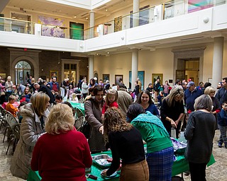 Families from around the area participated in free activities at the Butler Institute of American Art Family Fun Day at the museum in Youngstown on Sunday. Some of the activities included decorating cookies, face painting and various holiday crafts.