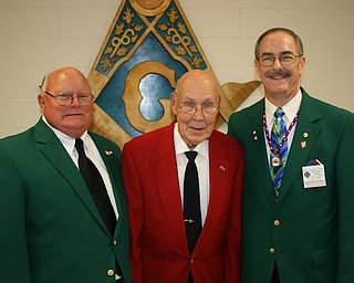 Charles H. Houck Sr. of Poland Township was presented with a 50-year service award recently at a banquet at the Argus Masonic Center in Canfield. Houck received recognition for his service to the Grand Commandery of Knights Templar of the State of Ohio. Houck served as eminent commander of the Niles Commandery three times. He also was appointed and served as deputy division commander of the 9th Division, for the Grand Commandery of Knights Templar of the State of Ohio. He was again honored in 2012 by being selected for the prestigious KCT Award, Knight Commander of the Temple. Houck was a fireman for 38 years for Poland Village before he retired. Above, center, Houck receives his award from, left, Dale Hawkins, past Commander of St. John’s Commandery 20 K.T.; and Richard J. Brady, past Right Eminent Grand Commander of Knights Templar of the State of Ohio.
