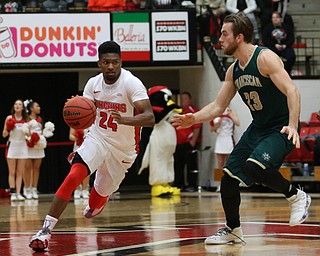 Youngstown State guard Cameron Morse (24) charges towards the basket against Franciscan center JP Dombrowski (23) during the first half of a NCAA College Basketball game, Tuesday, Nov. 14, 2017, at Beeghly Center in Youngstown. Youngstown State won 134-46...(Nikos Frazier | The Vindicator)..
