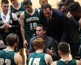 Franciscan head coach Joe Wallace talks with his players during a time out during the first half of a NCAA College Basketball game, Tuesday, Nov. 14, 2017, at Beeghly Center in Youngstown. Youngstown State won 134-46...(Nikos Frazier | The Vindicator)..