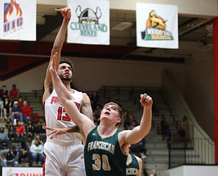 Youngstown State center Alex Wilbourn (13) puts up two against Franciscan guard Nate Nowicki (31) during the first half of a NCAA College Basketball game, Tuesday, Nov. 14, 2017, at Beeghly Center in Youngstown. Youngstown State won 134-46...(Nikos Frazier | The Vindicator)..