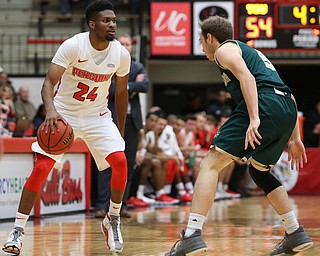 Youngstown State guard Cameron Morse (24) dribbles before passing to a teammate during the first half of a NCAA College Basketball game, Tuesday, Nov. 14, 2017, at Beeghly Center in Youngstown. Youngstown State won 134-46...(Nikos Frazier | The Vindicator)..
