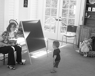 Neighbors | Zack Shively.Poland librarian Vicki Peck read "I Like to Sqeak! How Do You Speak?" by Fiona Galloway to the babies in the Children's Activity Room.