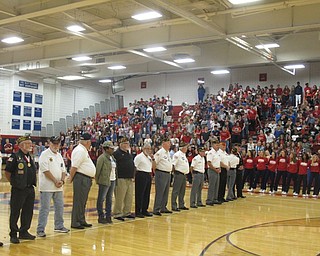 Neighbors | Zack Shively.Austintown Fitch held a special assembly to honor the veterans who came to the school to talk to their students. The band and show choir performed for them. The show choir sang "God Bless the U.S.A." and the students in the stands stood and sang the chorus.