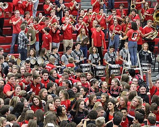 Neighbors | Abby Slanker.To close Canfield High School’s pep rally, the students gathered on the gym floor, and accompanied by the CHS band, sang the school’s Alma Mater.