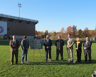 Neighbors | Zack Shively.Austintown schools broke ground on the athletic complex project on Nov. 8. The project will place new turf on the football field, put turf for the first time on the baseball field and create a brand new turf field that will be used for multiple purposes, such as soccer and band practice. Pictured are, from left, superintendent Vincent Colaluca, Harold Porter, David Richie, Lewis VanHoose, Alex Benyo, Kathy Mock and treasurer A.J. Ginetti.