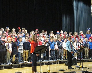 Neighbors | Zack Shively.Dobbins Elementary third graders had a patriotic concert for Veterans Day on Nov. 9 at Poland Seminary High School. Dana Veneskey directed the third grade chior. Veneskey served in the military.