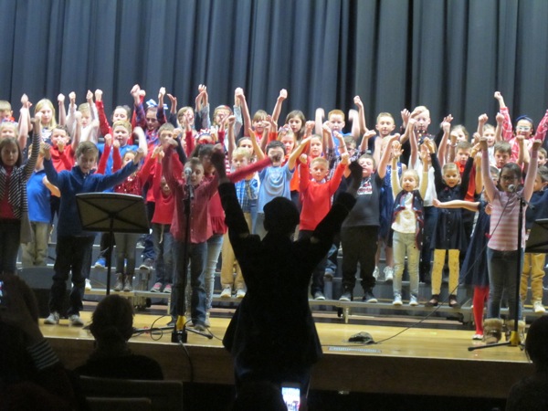 Neighbors | Zack Shively.Veneskey has taught at Poland Elementary schools for three years and has performed a patriotic concert every year. Pictured, the students sang “Thank You Soldiers“ by Michael and Angela Souders