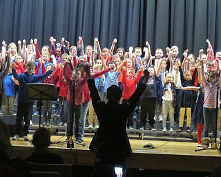 Neighbors | Zack Shively.Veneskey has taught at Poland Elementary schools for three years and has performed a patriotic concert every year. Pictured, the students sang “Thank You Soldiers“ by Michael and Angela Souders