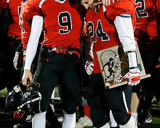 SALEM, OHIO - NOVEMBER 17, 2017:  Canfield's Nick Ieraci (9) and Angelo Petracci (24) console each other after their loss to SVSM at Reilly Stadium, Salem High School.  MICHAEL G TAYLOR | THE VINDICATOR