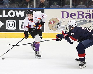 Youngstown Phantoms forward Matthew Barry (26) passes before Team USA defenseman DJ King (27) can steal during the first period as Team USA takes on the Youngstown Phantoms, Friday, Nov. 17, 2017, at the Covelli Centre in Youngstown...(Nikos Frazier | The Vindicator)..
