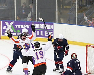 Youngstown Phantoms center Curtis Hall (20) celebrates a goal with Youngstown Phantoms forward Chase Gresock (19) during the first period as Team USA takes on the Youngstown Phantoms, Friday, Nov. 17, 2017, at the Covelli Centre in Youngstown...(Nikos Frazier | The Vindicator)..