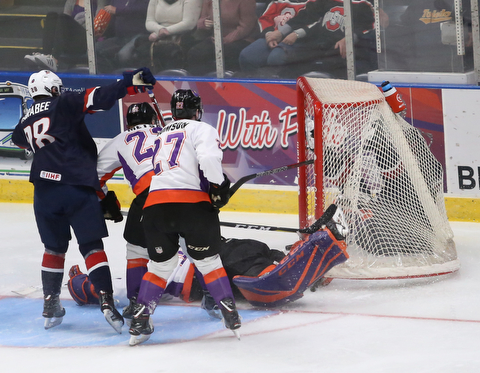 Team USA forward Oliver Wahlstrom (18) takes the puck and net away for a goalduring the second period as Team USA takes on the Youngstown Phantoms, Friday, Nov. 17, 2017, at the Covelli Centre in Youngstown...(Nikos Frazier | The Vindicator)..