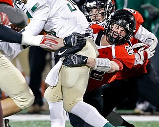 SALEM, OHIO - NOVEMBER 17, 2017:  Canfield's Tyler Dobrindt (22) tackles SVSM Terrances Keyes (34)  during the 2nd qtr. at Reilly Stadium, Salem High School.  MICHAEL G TAYLOR | THE VINDICATOR