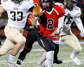 SALEM, OHIO - NOVEMBER 17, 2017:  Canfield's Vinny Fiorenza (2) has the ball pop out of his grasp but he regains control of the ball during the 2nd qtr. at Reilly Stadium, Salem High School.  MICHAEL G TAYLOR | THE VINDICATOR