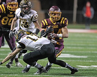 Peyton Remish (44) of South Range jukes out Black River's Brendon Weidrick (17) during the first half of Friday nights matchup at Canal Fulton.  Dustin Livesay  |  The Vindicator  11/17/17  Canal Fulton.