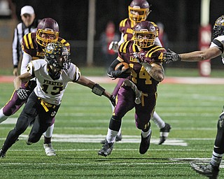 Peyton Remish (44) of South Range finds a hole in the Black River defense during the first half of Friday nights matchup at Canal Fulton.  Dustin Livesay  |  The Vindicator  11/17/17  Canal Fulton.