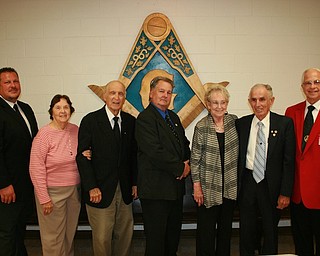 Royal Arch Masons, Ashlar and Youngstown Chapters, came together recently for a dinner at Argus Lodge No. 545 in Canfield to honor longtime members of both chapters. William Robinette of Ashlar Chapter was presented with his 60-year service award, and Nicholas Yurchyk of Youngstown Chapter received his 65-year service award. Above, from left, are Zel E. Bush, presiding officer of Youngstown Chapter; Nira Robinette; Robinette; James Daley, presiding officer of Ashlar Chapter; Mildred Beck; Yurchyk; and James A. Streeky, district deputy for the 19th District.