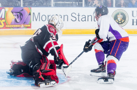 Scott R. Galvin | The Vindicator.Youngstown Phantoms right wing Max Ellis (6) shoots the puck past Chicago Steel goalie Oskar Autio (35) for a goal during the second period at the Covelli Centre on Saturday, November 18, 2017.