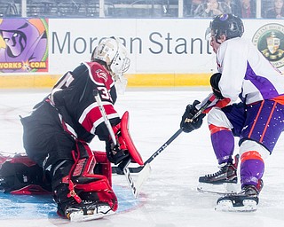 Scott R. Galvin | The Vindicator.Youngstown Phantoms right wing Max Ellis (6) shoots the puck past Chicago Steel goalie Oskar Autio (35) for a goal during the second period at the Covelli Centre on Saturday, November 18, 2017.