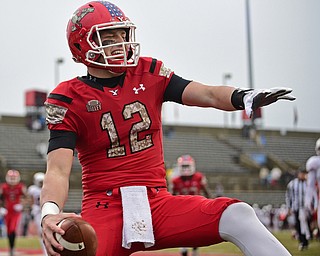 YOUNGSTOWN, OHIO - NOVEMBER 18, 2017: Youngstown State's Ricky Davis spikes the football after scoring a touchdown during the second half of Saturday afternoons game at Stambaugh Stadium. Youngstown State won 38-10. DAVID DERMER | THE VINDICATOR