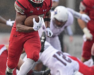 YOUNGSTOWN, OHIO - NOVEMBER 18, 2017: Youngstown State's Tevin McCaster runs in the open field before running into the end zone to score a touchdown during the second half of Saturday afternoons game at Stambaugh Stadium. Youngstown State won 38-10. DAVID DERMER | THE VINDICATOR