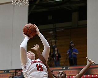 Youngstown State forward Mary Dunn (15) goes up for the shot as Ohio Valley forward ArielÊJohnson (22) tries to block her shot during the first quarter as Ohio Valley University takes on Youngstown State University in a NCAA basketball game, Monday, Nov. 20, 2017, at the Beeghly Center in Youngstown. YSU won 86-59...(Nikos Frazier | The Vindicator)..
