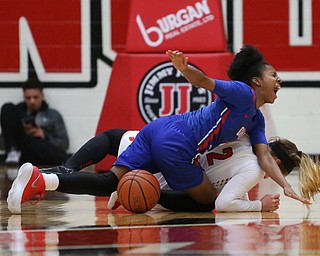 Ohio Valley guard AmiayaÊMelvins (1) screams out as she falls down under Youngstown State guard Alison Smolinski (2) during the third quarter as Ohio Valley University takes on Youngstown State University in a NCAA basketball game, Monday, Nov. 20, 2017, at the Beeghly Center in Youngstown. YSU won 86-59...(Nikos Frazier | The Vindicator)..