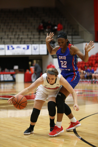 Youngstown State guard Morgan Brunner (13) tries to push off Ohio Valley forward ArielÊJohnson (22) during the fourth quarter as Ohio Valley University takes on Youngstown State University in a NCAA basketball game, Monday, Nov. 20, 2017, at the Beeghly Center in Youngstown. YSU won 86-59...(Nikos Frazier | The Vindicator).