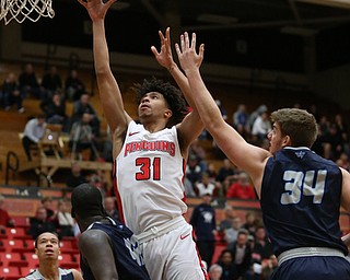 Youngstown State forward Michael Akuchie (31) goes up for a layup during the first half as Westminister College takes on Youngstown State in a NCAA basketball game, Tuesday, Nov. 21, 2017, at the Beeghly Center in Youngstown. YSU won 91-83...(Nikos Frazier | The Vindicator)..