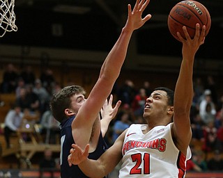 Youngstown State forward Noe Anabir (21) goes up against Westminister College center BlakeÊPayne (34) during the first half as Westminister College takes on Youngstown State in a NCAA basketball game, Tuesday, Nov. 21, 2017, at the Beeghly Center in Youngstown. YSU won 91-83...(Nikos Frazier | The Vindicator)..