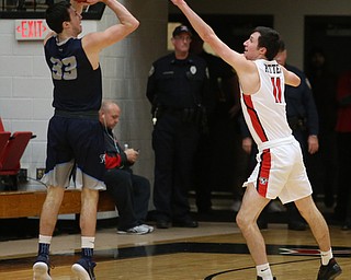 Youngstown State guard Dan Ritter (11) goes up to block Westminister College guard AnthonyÊRitter (33) during the second half as Westminister College takes on Youngstown State in a NCAA basketball game, Tuesday, Nov. 21, 2017, at the Beeghly Center in Youngstown. YSU won 91-83...(Nikos Frazier | The Vindicator)..