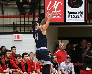 Westminister College guard CameronÊKane-Johnson (4) goes up for three during the first half as Westminister College takes on Youngstown State in a NCAA basketball game, Tuesday, Nov. 21, 2017, at the Beeghly Center in Youngstown. YSU won 91-83...(Nikos Frazier | The Vindicator)..