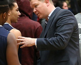 Youngstown State head coach Jerrod Calhoun shakes Westminister College guard CameronÊKane-Johnson (4)'s hand after Westminister College lost to Youngstown State, 83-91, in a NCAA basketball game, Tuesday, Nov. 21, 2017, at the Beeghly Center in Youngstown. ..(Nikos Frazier | The Vindicator)..