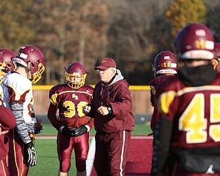 South Range Head coach Dan Yeagley runs his players through a drill during a post-season practice, Tuesday, Nov. 21, 2017, at South Range High School in Canfield...(Nikos Frazier | The Vindicator)