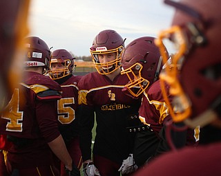 Aniello Buzzacco (14) in the huddle during a post-season practice, Tuesday, Nov. 21, 2017, at South Range High School in Canfield...(Nikos Frazier | The Vindicator)