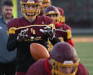 Aniello Buzzacco (14) catches the snap before handing the ball off during a post-season practice, Tuesday, Nov. 21, 2017, at South Range High School in Canfield...(Nikos Frazier | The Vindicator)