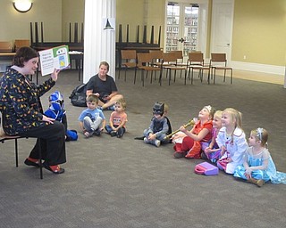 Neighbors | Zack Shively.Children came to the Poland library dressed in costumes for Halloween story time and games on Oct. 14. Librarian Amanda Koller read Nick Sharratt’s “What’s in the Witch’s Kitchen” at the beginning of the event.