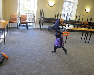 Neighbors | Zack Shively.The Poland library gave the children at the Halloween Costume Ball a few games to play, including ring toss and a beanbag tossing game.