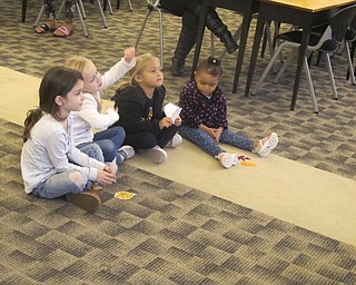 Neighbors | Zack Shively.Children listened to Austintown librarian Lindsey Cramer tell them a story at "Playtime at Your Library" on Oct. 16. After the story, the children played games that taught them to use different skills.